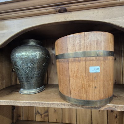 Lot 2531 - A coopered planter and an eastern brass vase.