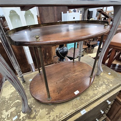 Lot 2541 - A campaign-style mahogany and brass two-tier...