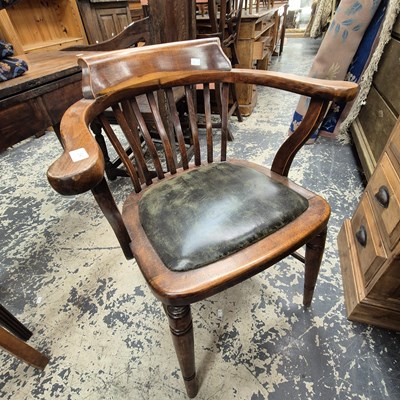 Lot 2545 - An early 20th-century office armchair.