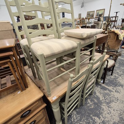 Lot 2546 - A pine kitchen table and six matching...