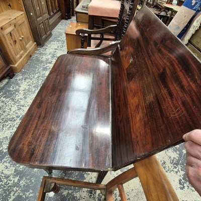 Lot 2559 - A 19th-century fold-over tea table.
