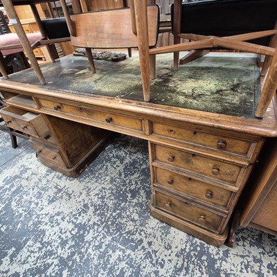 Lot 2562 - A Victorian oak twin pedestal partner's desk.