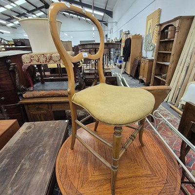 Lot 2566 - A small, elegant Victorian balloon-back chair.