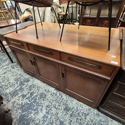 Lot 2571 - A retro teak sideboard.