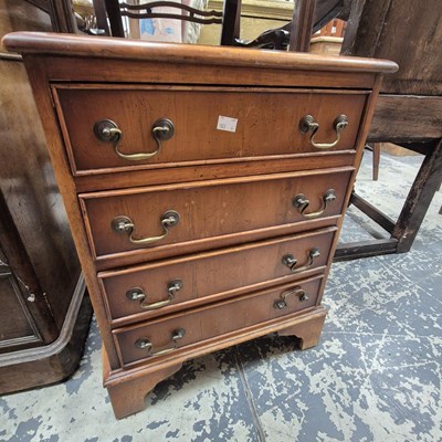 Lot 2574 - A small four-drawer yew wood chest