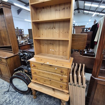Lot 2586 - A pine coffee table, a chest of drawers and a...