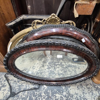 Lot 2589 - Three oval wall mirrors.