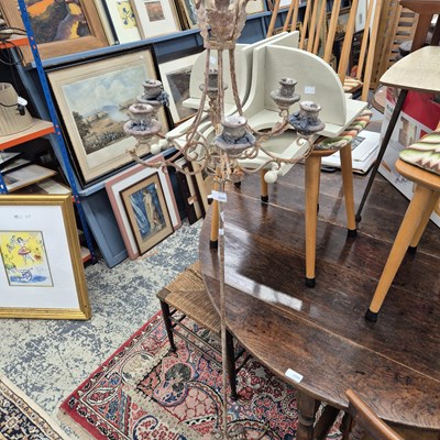 Lot 2592 - A wrought-iron candelabra.