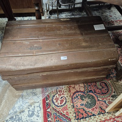 Lot 2598 - A vintage tin trunk.