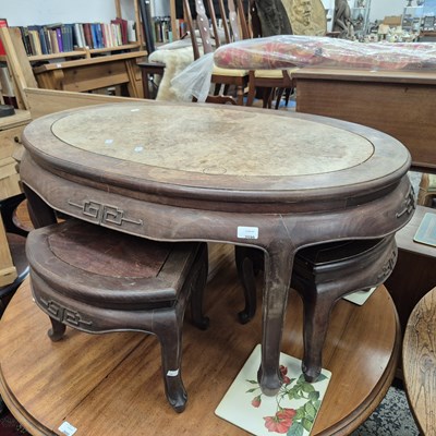 Lot 2599 - An oriental coffee table with nesting tables...