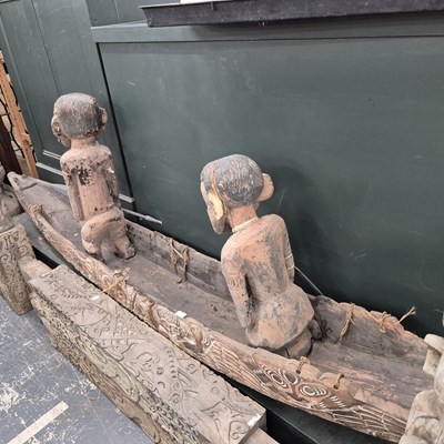 Lot 2632 - An Indonesian carved canoe with an alligator...