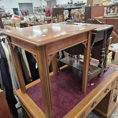 Lot 2636 - An oak occasional table and one other.