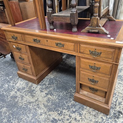 Lot 2637 - A late Victorian oak pedestal desk.