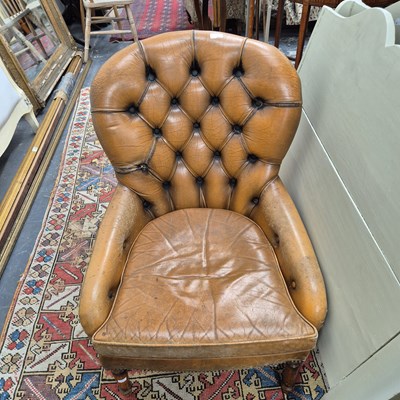 Lot 2651 - A leather button-upholstered small armchair...