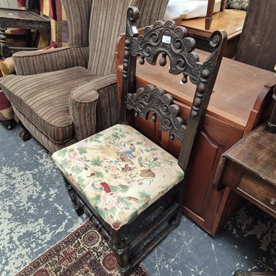 Lot 2656 - A pair of carved oak side chairs and a swing...