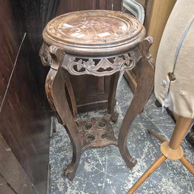 Lot 2700 - An oriental plant stand.