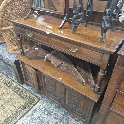 Lot 2704 - An oak two-tier buffet.