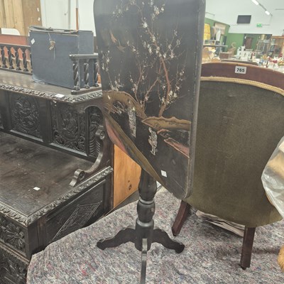 Lot 2708 - A lacquered tilt-top table.