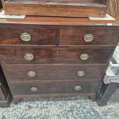 Lot 2720 - A late Georgian mahogany five-drawer chest.