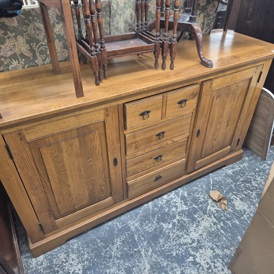 Lot 2726 - A good quality oak sideboard with central...