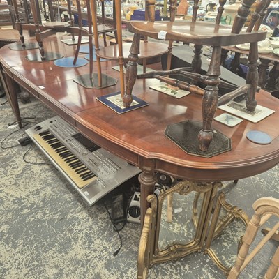 Lot 2733 - A modern mahogany extending table.