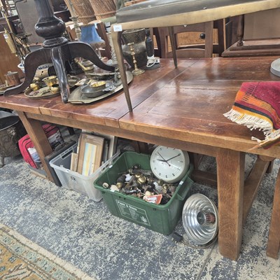 Lot 2749 - A large hardwood extending table and six...