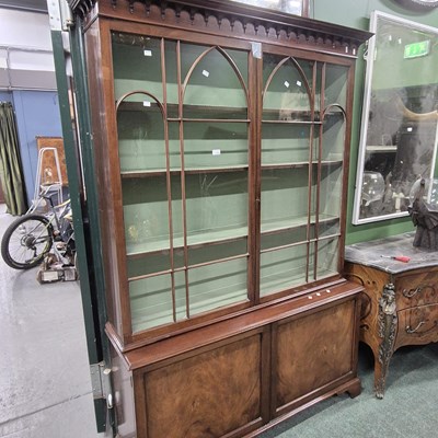 Lot 2785 - A large 19th-century mahogany bookcase cabinet....