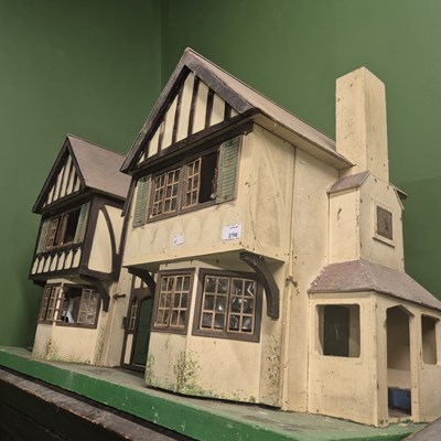 Lot 2798 - A large dolls house.