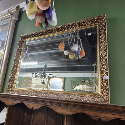 Lot 2823 - A gilt-framed wall mirror.