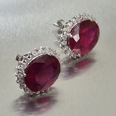 Lot 39 - A pair of large ruby and diamond cluster...