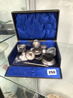 Lot 250 - A small hallmarked silver inkwell, a pair of...
