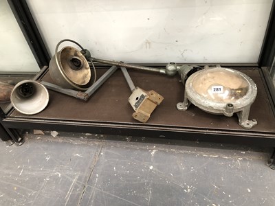 Lot 281 - Three industrial light fittings.
