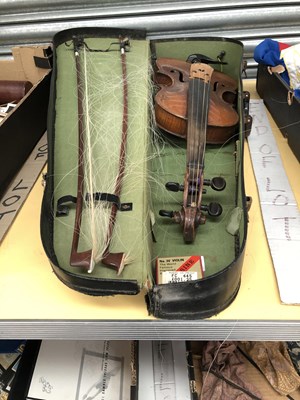 Lot 378 - A violin with case and two bows.