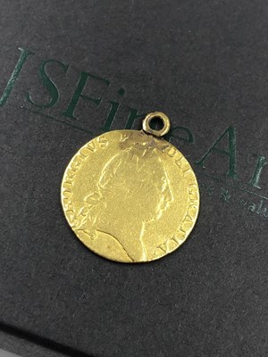 Lot 3 - A Georgian 1788 22ct gold Spade Guinea coin...