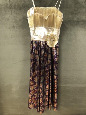 Lot 177 - A gold and purple vintage John Charles dress...