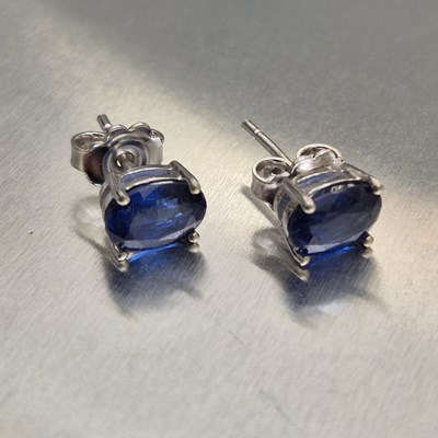 Lot 14 - A pair of oval kyanite and silver stud...