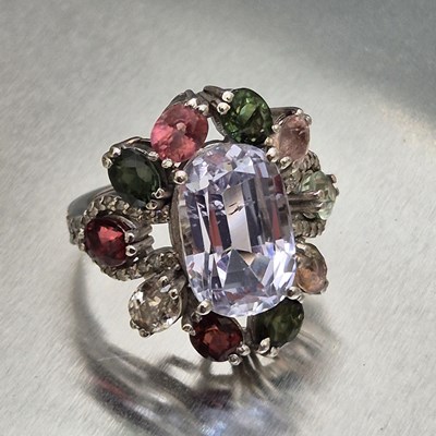 Lot 29 - A large and ornate silver multi-gem set dress...