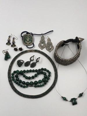 Lot 28 - Jewellery to include an eastern silver tribal...