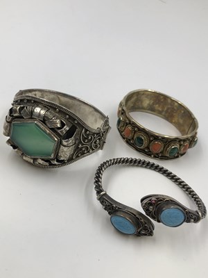 Lot 36 - A Middle Eastern serpent heat fleximale torque...