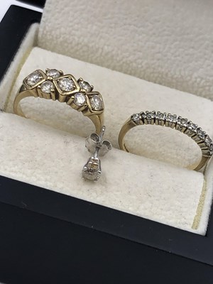 Lot 48 - A 9ct hallmarked gold diamond half eternity...