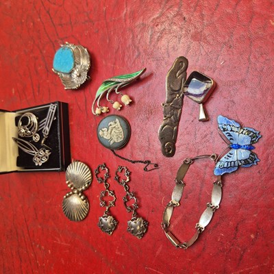 Lot 56 - Silver jewellery, including a lily of the...
