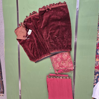 Lot 288 - A collection of red silk and damask offcut...