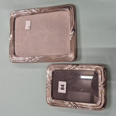 Lot 84 - Two silver-fronted photo frames, unhallmarked...