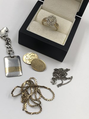 Lot 76b - A 9ct hallmarked gold diamond set cluster ring,...