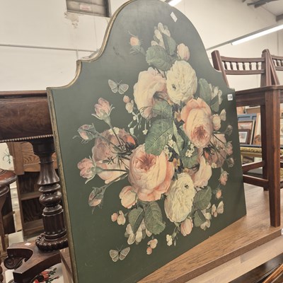 Lot 1136 - A green ground fire screen decorated with pink...