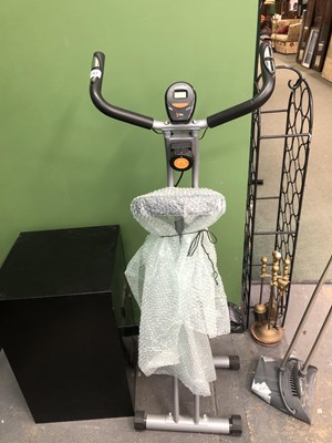 Lot 143 - A V-fit exercise bike.