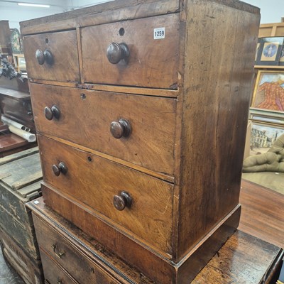 Lot 1259 - A small 19th century chest of drawers. H 80 W...