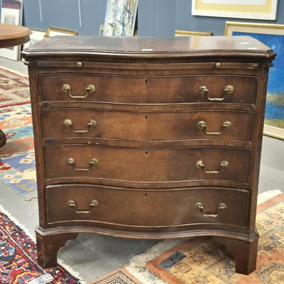 Lot 384 - A George III style mahogany serpentine chest...