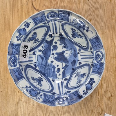 Lot 403 - A 17th century blue and white klapsmut bowl...
