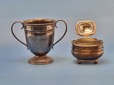 Lot 407 - A silver two-handled trophy cup by Henry Atkin,...